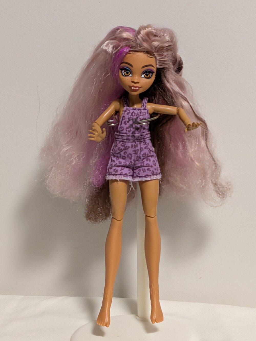 Monster High Clawdeen Doll with Purple Hair and Purple Rhomper.